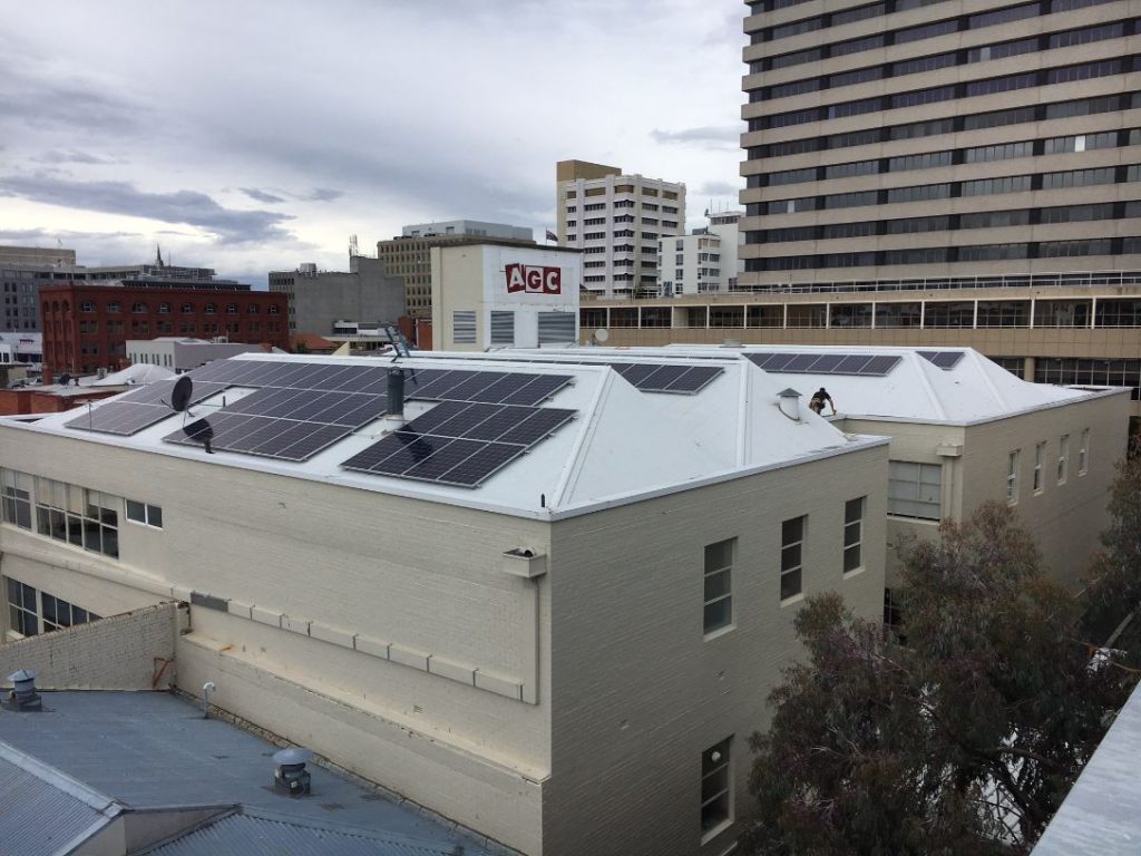 Photo of solar panels on the roof of the Anglicare Tasmania Hobart office on Collins Street.