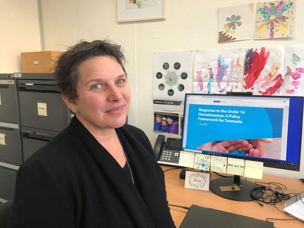 Catherine Robertson sitting at her desk at the Social Action and Research Centre, Tasmania.