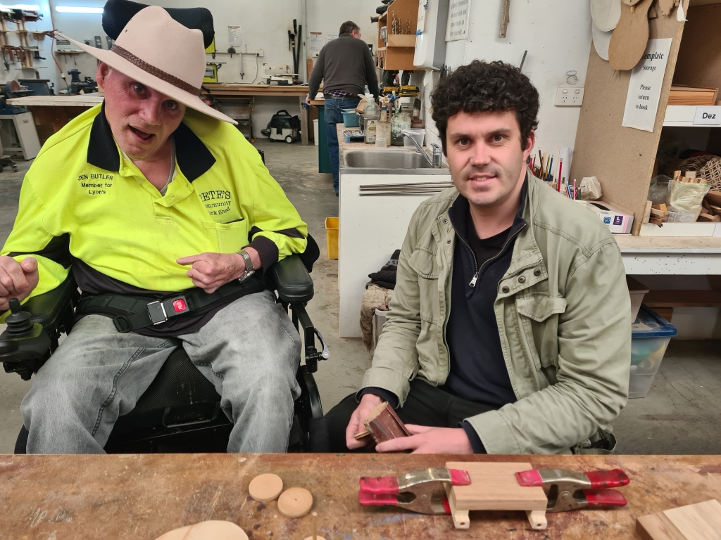 Garry regularly attends the Bridgewater Men’s Shed, where he makes model trucks. He’s pictured here on the left with support worker Alan Dart.