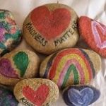 a collection of painted rocks