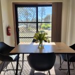 A table in one of the Rocherlea units that seats four.