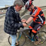 Graham is helping Mathew to put on a wrist support