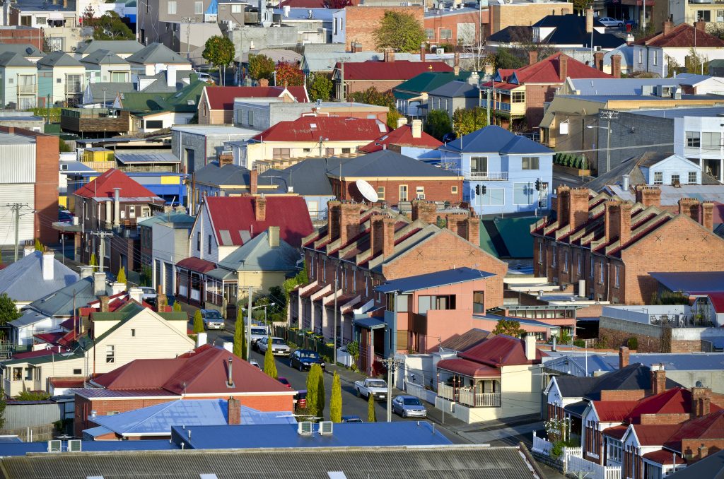 A view of a street with lots of houses