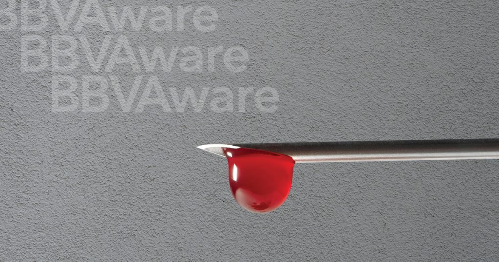 The tip of a needle with a drop of blood about to drip. The words BBV Aware.