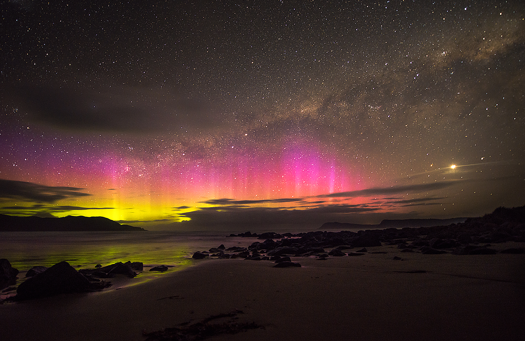 Pictured: Aurora australis, taken from Cloudy Bay, Bruny Island, Tasmania.
