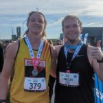 Ryleigh and Mitchell celebrating finishing a half marathon in Launceston